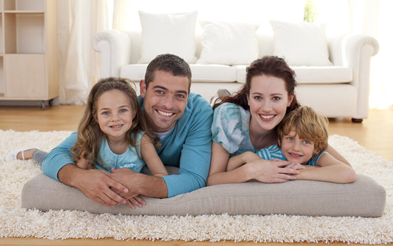 happy family on living room floor