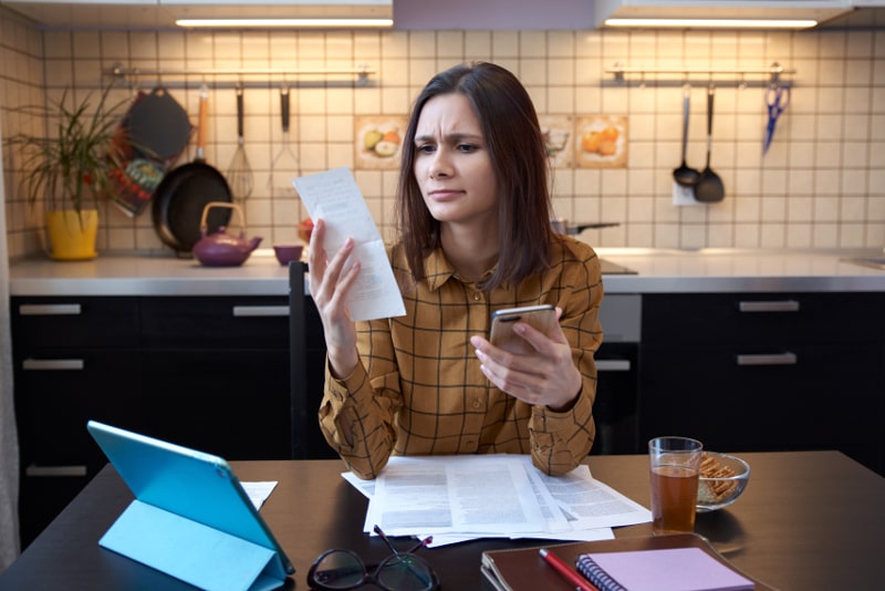 Woman Figuring Out Bills
